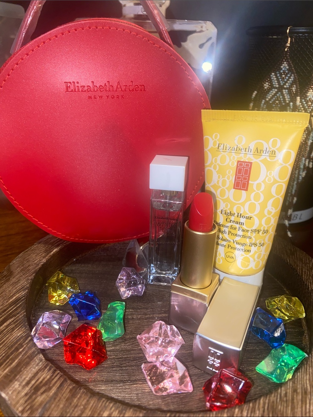 Elizabeth Arden Red Cosmetic Case with Yellow SPF Tube and Red Lipstick
